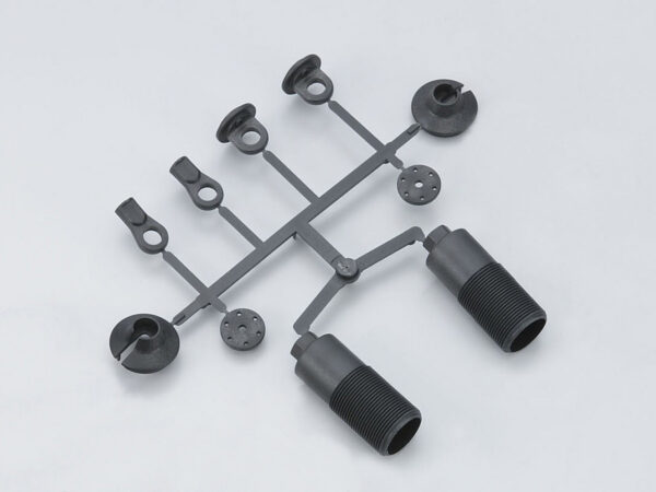 Plastic pieces of Kyosho IF232 shock absorbers