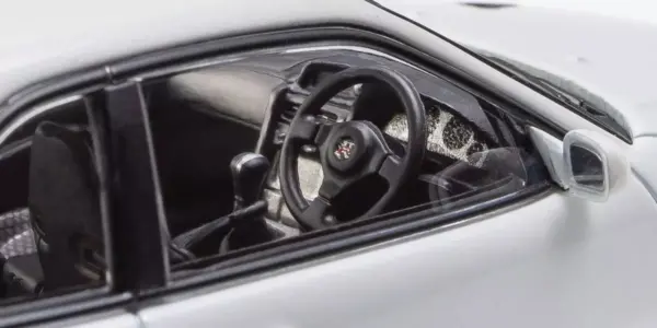 Kyosho 1:43 Nissan Skyline R34 Gt-R v-Spec Ii White Pearl