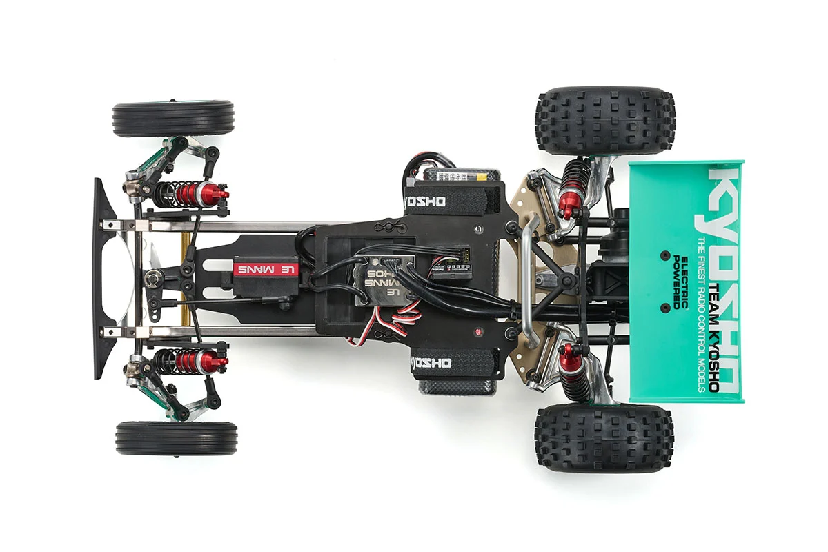 Kyosho Tomahawk '85 WC Worlds Spec — chassis topside top-down view with body removed, showing Le Mans servo, ESC and electronics layout