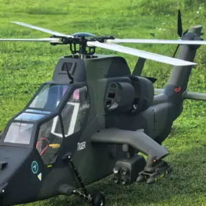 FLISHRC Tiger 700 RC helicopter front three-quarter view showing the four-blade main rotor head and stub wings