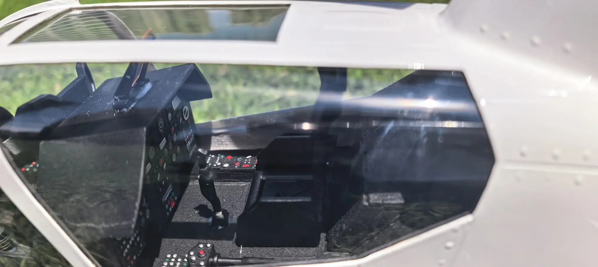 Forward gunner cockpit detail under the clear canopy of the FLISHRC AH-1 Cobra scale RC helicopter