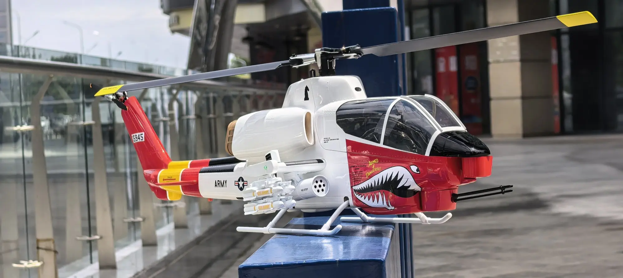 FLISHRC AH-1 Cobra white and red 500-size scale helicopter, three-quarter view