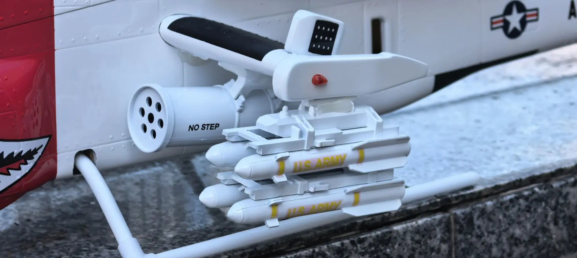 Stub wing weapon pylons and scale ordnance on the FLISHRC AH-1 Cobra scale RC helicopter