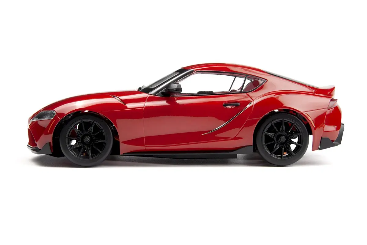 Side profile of the HPI Stage-D24 Toyota GR Supra Prominence Red hardbody